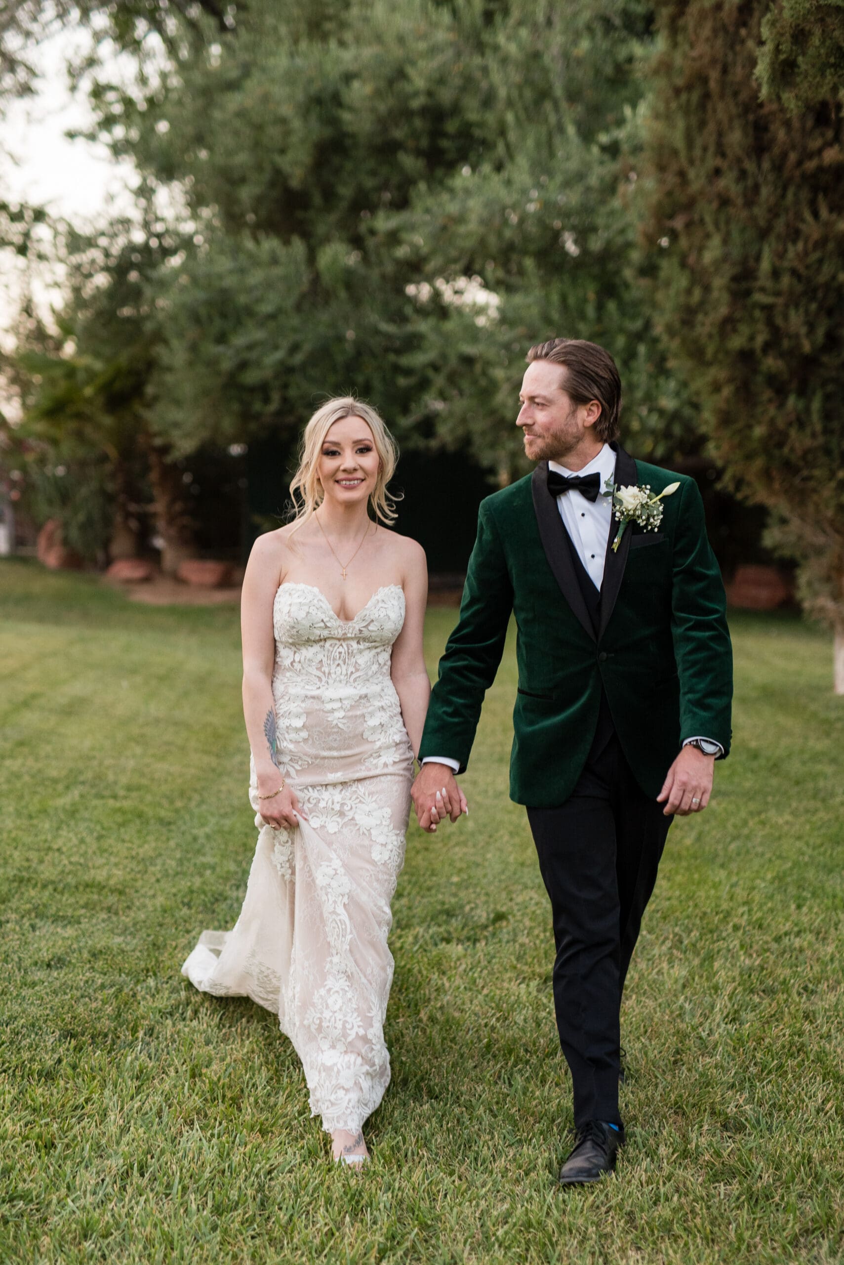 Newlyweds share a romantic sunset moment at The Secret Garden Las Vegas wedding venue.